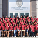 pmecs students pose on steps of Swearingen building