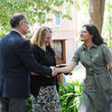 Dean and shaking hands with award winner