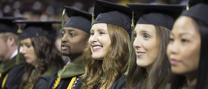 new graduates at commencement