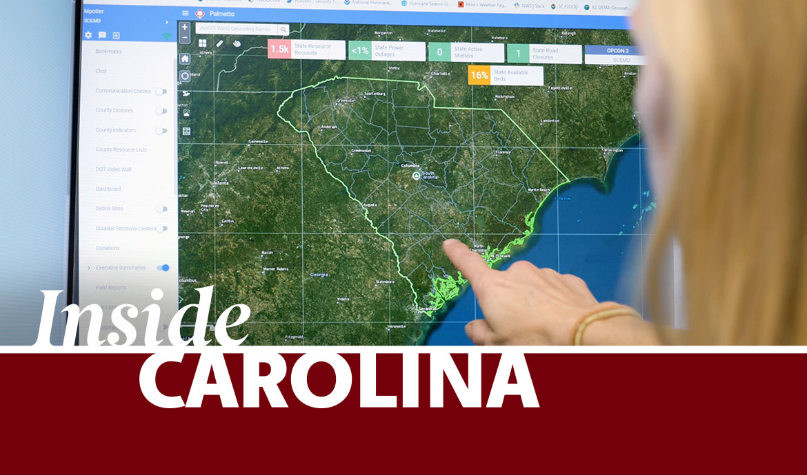 graphic that has a frame with the words Inside Carolina over an image of a woman pointing at a computer screen with a map of South Carolina on it