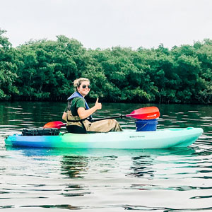 Ana Bishop kayaks at Baruch Marine Field Laboratory near Georgetown